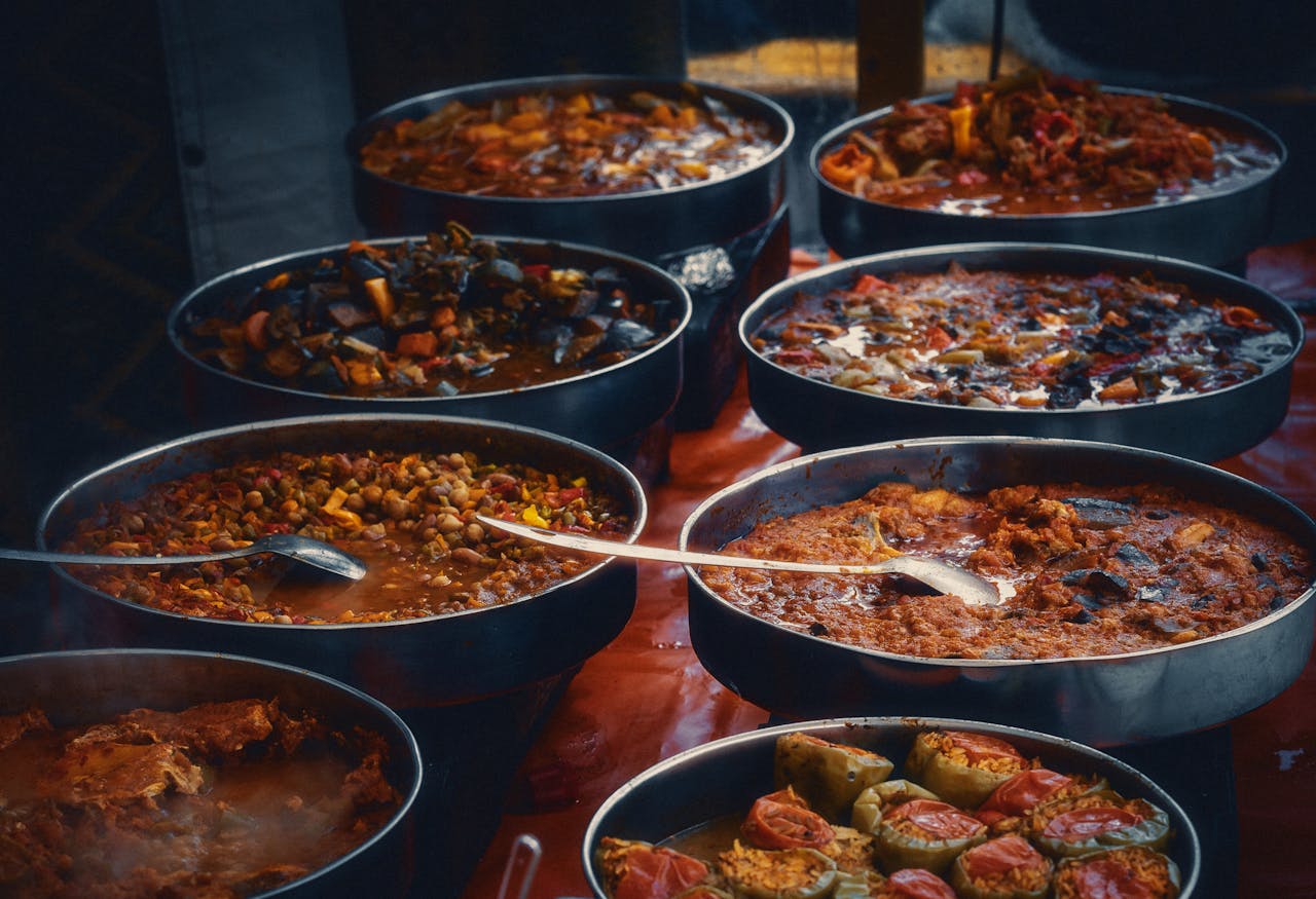 A variety of traditional Turkish dishes served in Berlin market bowls, showcasing rich, flavorful cuisine.
